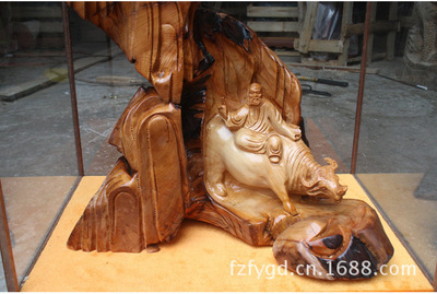 佛緣匠心 紅豆杉木雕老子出關的藝術魅力